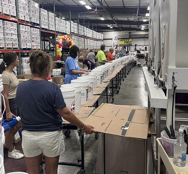 b2ap3 large Volunteers packing clean up kits