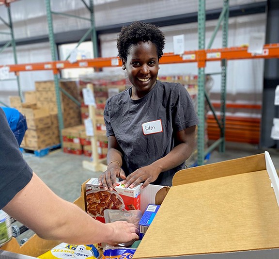 b2ap3 large another volunteer filling boxes LR